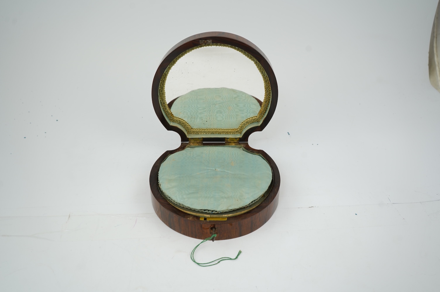 An early Victorian rosewood and mother of pearl inlaid sewing box